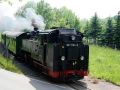 Weißeritztalbahn - der Dampfzug mit der Schmalspur-Dampflok 99 1734-5 ist unterwegs im Osterzgebirge