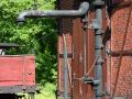 Das Sächsische Schmalspurbahn-Museum Rittersgrün - der historische Wasserkran vor dem Lokschuppen