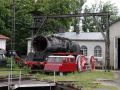 Das Bayerische Eisenbahn Museum in Nördlingen - Fahrgestell und Kessel einer Dampflok vor der Werkstatt