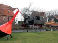Nordseeinsel Wangerooge - Die alte Dampflok 99 211 der Inselbahn auf dem Denkmalsockel am Inselmuseum