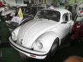 Ein in Mexico als Taxi eingesetzter VW-Käfer mit verbreiterter rechter Tür - ein Original im Automuseum Braunschweig