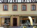 Neustadt an der Weinstrasse - ein Fachwerkhaus in der Badstubengasse mit dem Geschäft 'Die Käseglocke'